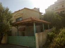 ارض للبيع بدابوق حوض المنش م1085متر على شارع 8 متر يوجد بناء بسعر المتر 490دينار