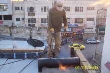 عزل اسطح وجدران وتزفيت ساحات