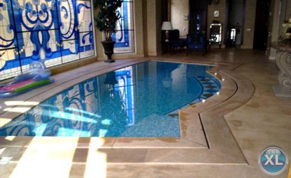 Making Swimming Pool شركة كنزي لـ انشاء حمامات السباحة