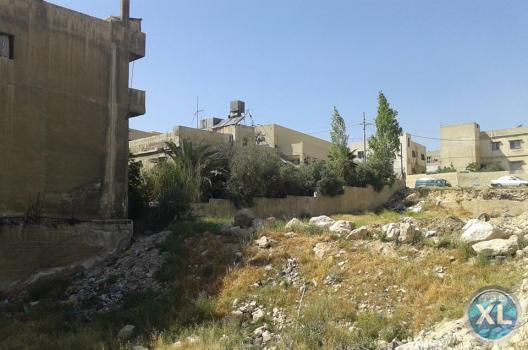 ارض تجاري للبيع في ابو علندا/ طريق الحزام