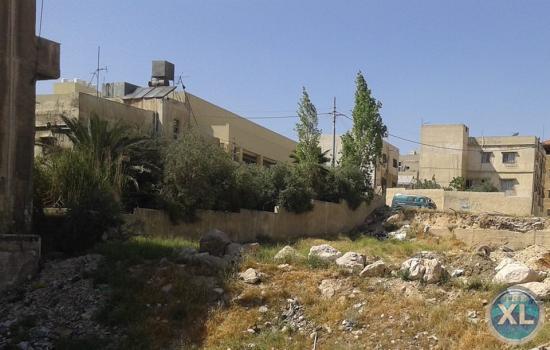 ارض تجاري للبيع في ابو علندا/ طريق الحزام